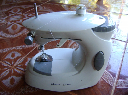 จักรเย็บผ้าแบบพกพา