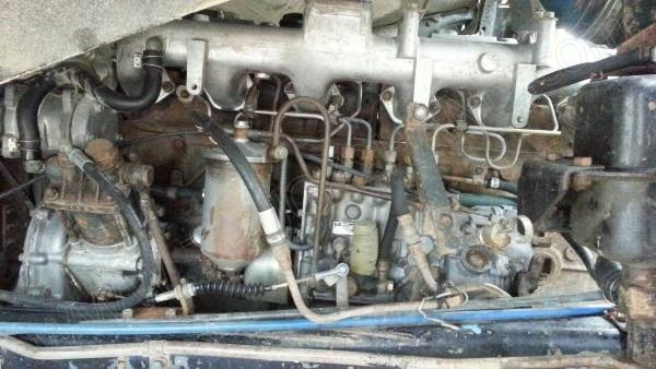 รถบรรทุก 10 ล้อดั๊มพ์ท้องเรือ  ยี่ห้อ NISSAN  ลงหัว HINO 2 เพลา  225 แรงม้า