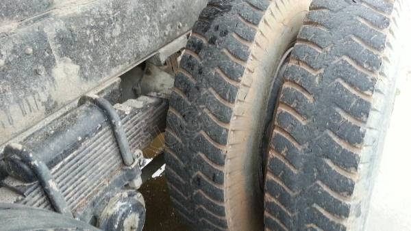 รถบรรทุก 10 ล้อดั๊มพ์ท้องเรือ  ยี่ห้อ NISSAN  ลงหัว HINO 2 เพลา  225 แรงม้า