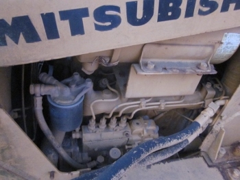 ขาย-รถแทรกเตอร์ ดันดิน MITSUBISHI: FA 50 รุ่นแทรคเหล็ก ตีนเป็ด กว้าง 70 ซม. พร้อมโรตารี่พรวนดินติดท้าย ยาว 2.6 เมตร