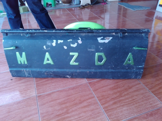 ฝาท้ายกระบะมาสด้า 1000 ตัวหนังเล็ก