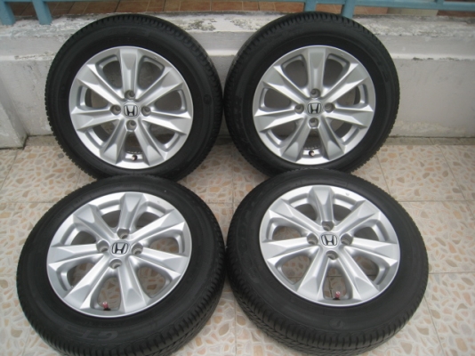 ขายล้อแม็ก Honda jazz 15"x5.5" et45 4รู100 +ยาง ปี3612 สนใจติดต่อเล็กคลองสามครับ (081-3747940)