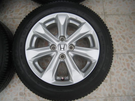ขายล้อแม็ก Honda jazz 15"x5.5" et45 4รู100 +ยาง ปี3612 สนใจติดต่อเล็กคลองสามครับ (081-3747940)