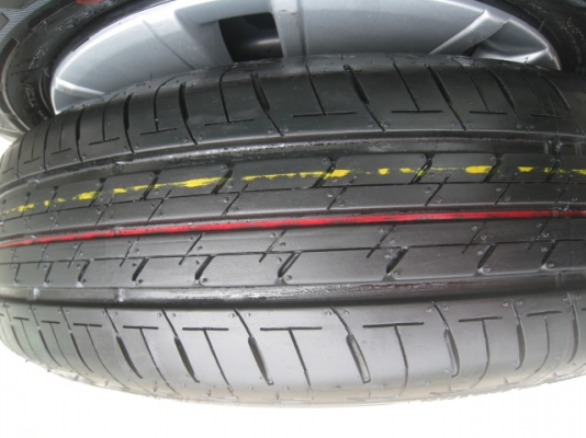 ขายกะทะล้อ Mitsubishi attrage ป้ายแดง ขอบ14 4รู100 +ยางปี13 สนใจติดต่อเล็กคลองสามครับ (081-3747940)