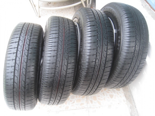 ขายกะทะล้อ Nissan almera ป้ายแดง ขอบ14 4รู100 + ยาง ปี13  สนใจติดต่อเล็กคลองสามครับ (081-3747940)