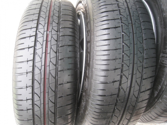 ขายกะทะล้อ Nissan almera ป้ายแดง ขอบ14 4รู100 + ยาง ปี13  สนใจติดต่อเล็กคลองสามครับ (081-3747940)