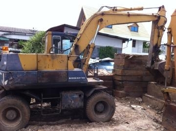 รถแบคโฮล้อยาง PW100-5 เครื่องปั้มเดิม2เพลา พร้อมหัวเจาะ