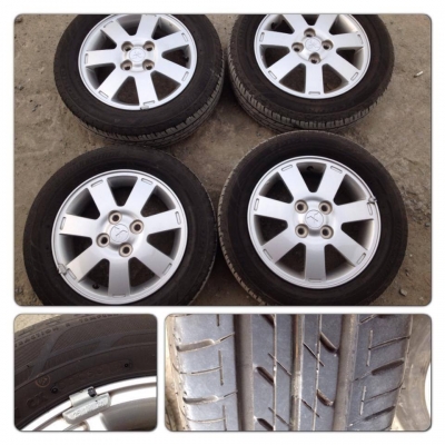 ขายล้อแม็ก Mitsubishi Mirage ขอบ 14 พร้อมยาง ปี 12 ราคา 5,300บาทถูก
