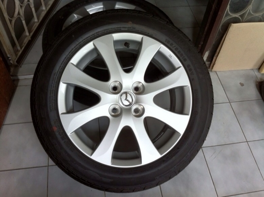 ขายล้อแม็ก Mazda 2. 15". พร้อมยางป้ายแดง ใหม่มาก ปี13