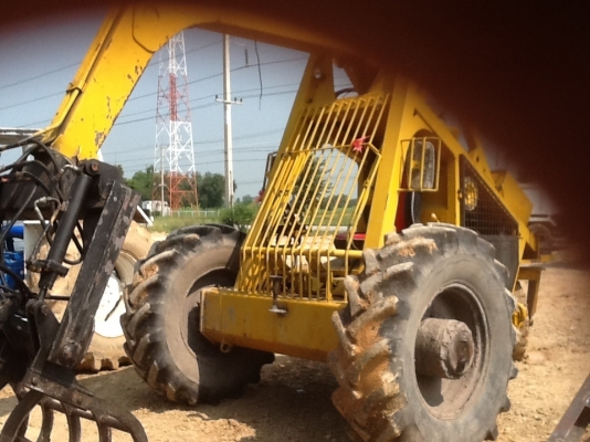 รถคีบอ้อยสามล้อเบว