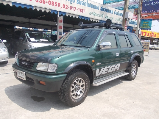 ขาย ปี 2001 อีซูซุ เวก้า  เครื่อง 2 J ติดแก็ส LPG ออโต้ สีเขียว สวย บาง เดิม