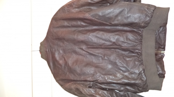 เสื้อหนังสภาพดี ขนาด  L