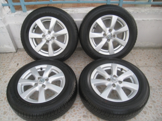 ขายล้อแม็ก Nissan almera 15"x5.5" et40 4รู100 +ยาง ปี4412  สนใจติดต่อเล็กคลองสาม (081-3747940)