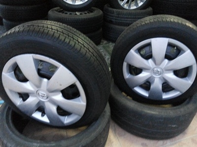 ขายล้อกะทะ15 4รู100 พร้อมฝาครอบและยาง 1 ชุด