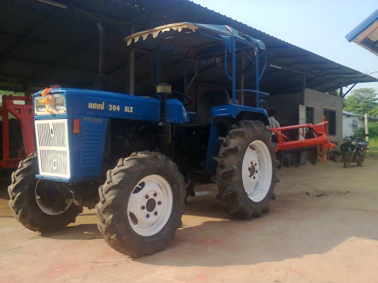 ขายรถไถนานั่งขับแชมป์ 304 SLX 2 เพลาพร้อมอุปกรณ์ ผาน 6X22 เช็ดสภาพแล้วพร้อมใช้