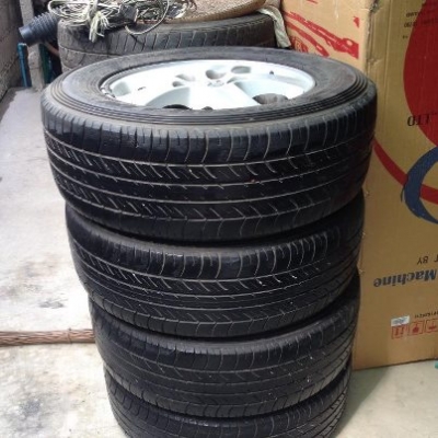 ขายแม๊กไทรทัน พร้อมยาง 215 65 R15 ขายแม๊กไทรทัน พร้อมยาง 215 65 R15