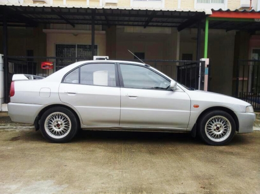 ขาย รถบ้านใช้เอง  LANCER 1.5 Limited ติดแก๊สหัวฉีด  หน้า-หลังไม่มีชน ไม่จมน้ำ สีสวย  ภาษี57ขับกลับได้เลย