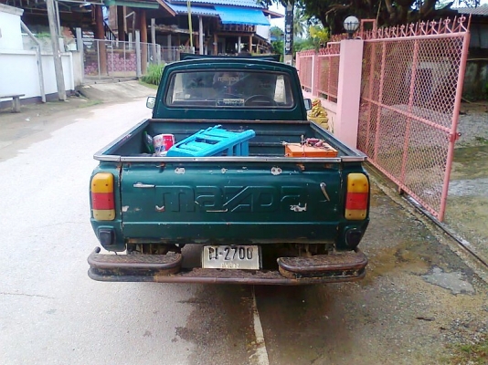 รถกระบะ Mazda 1000 สีเขียว เครื่องดี คัสซีดี เบรคดี ไฟส่องสว่างดี มีวิทยุ มีแอร์ มีทะเบียนพร้อมชุดโอน.