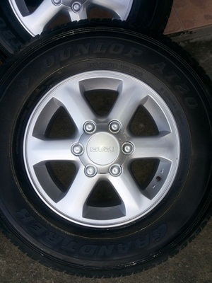 ขายแม็กISUZU 16 นิ้ว 6 ก้าน พร้อมยาง255/70/16ปี10 DUNLOP AT20 1 ชุด ขายแม็กISUZU 16 นิ้ว 6 ก้าน พร้อมยาง255/70/16ปี10 DUNLOP AT20 1 ชุด