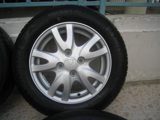 ขายล้อแม็กป้ายแดง Honda Brio 14"x5" et50 4รู100 +ยางผลิตสัปดาห์ที่23 ปี13 สนใจติดต่อเล็กคลองสามครับ (081-3747940)