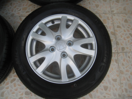 ขายล้อแม็กป้ายแดง Honda Brio 14"x5" et50 4รู100 +ยางผลิตสัปดาห์ที่23 ปี13 สนใจติดต่อเล็กคลองสามครับ (081-3747940)