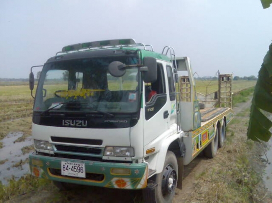 10ล้อเทเลอร์ บรรทุกรถเกี่ยว ISUZU ROCK210 หัวเด็กก้า2เพลา