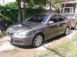 ขายรถ PROTON PERSONA 1.6 A/T รุ่นTOP ABS AIRBAG2ใบ  ปี2011 NGVจากโรงงาน สีน้ำตาลดำ