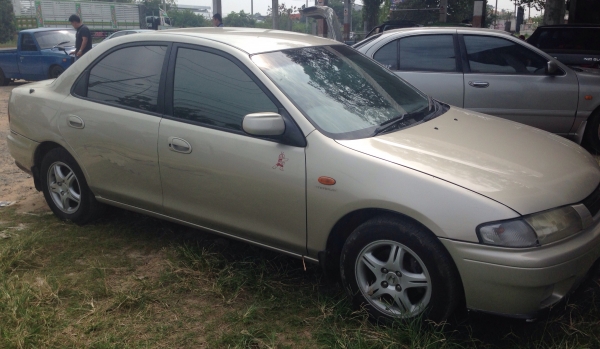 MAZDA 323 SEDAN 1.6 AT ปี 97 เครื่องแห้งแรงดีเดิมๆพร้อมใช้งาน ติดตั้งแก๊ส LPG ครบแล้ว ภายในเก๋งคอนโซลสวยครบ แอร์เย็น พ.เพาเวอร์ ก.ไฟฟ้า ภายนอกสีสันบางเดิมไม่มีชนหนัก ช่วงล่างล้อแม็กลายสวย ยางสภาพดี 4 เส้นประมาณ 70\% พร้อมใช้งาน เอกสารทะเบียนครบพร้อมโอน ราค