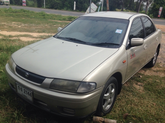MAZDA 323 SEDAN 1.6 AT ปี 97 เครื่องแห้งแรงดีเดิมๆพร้อมใช้งาน ติดตั้งแก๊ส LPG ครบแล้ว ภายในเก๋งคอนโซลสวยครบ แอร์เย็น พ.เพาเวอร์ ก.ไฟฟ้า ภายนอกสีสันบางเดิมไม่มีชนหนัก ช่วงล่างล้อแม็กลายสวย ยางสภาพดี 4 เส้นประมาณ 70\% พร้อมใช้งาน เอกสารทะเบียนครบพร้อมโอน ราค
