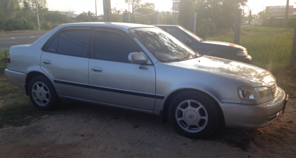 TOYOTA COROLLA HI-TOQUE GXi 1.6 MT ปี 43 รถบ้านสภาพดีพร้อมใช้งาน เครื่องแห้งแรงดีไม่มีเยิ้ม ติดตั้งแก๊ส LPG ครบพร้อมประหยัดสุดๆ ภายในเก๋งคอนโซลสวยครบพร้อม CD แอร์เย็น พ.เพาเวอร์ ก.ไฟฟ้า ช่วงล่างแน่นดี ล้อแม็ก ยางสภาพดี 4 เส้นประมาณ 60\% พร้อมใช้งาน เอกสารท