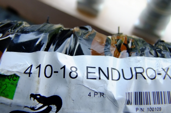 ยางวิบาก4.10 ของใหม่ พร้อมขอบเหล็ก 1.85 ขอบ 18 ยางวิบาก4.10 ของใหม่ พร้อมขอบเหล็ก 1.85 ขอบ 18