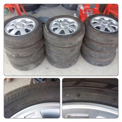 ขายล้อแม็ก Mitsubishi Mirage ขอบ 14 พร้อมยาง ปี 12 ราคา 4,900 บาทถูก