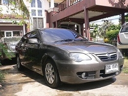 ขายรถ PROTON PERSONA 1.6 A/T รุ่นTOP ABS AIRBAG2ใบ  ปี2011 NGVจากโรงงาน สีน้ำตาลดำ