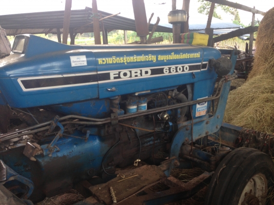 ขายรถไถFORD 77 - 1 เพลา มีภาพวีดีโอ เลขเครื่อง T1 C7NN6015A เลขเกียร์ C5NN ท้ายเบาะ D1NN รถสวยสภาพดีพร้อมใช้งาน  อุปกรณ์ครบพร้อม มีใบมีดดันหน้า ผาน5 สภาพดีมากพร้อมใช้งาน เอกสารอินวอย  เครื่องแห้งแรงดี ระบบไฮดรอลิกส์ดี ยางหน้าหลังสภาพประมาณ 70\% ราคา 278,00