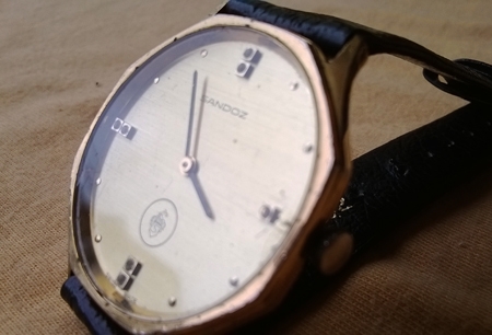 SANDOZ  ไขลาน กะไหล่ทอง ทรงแปดเหลี่ยม