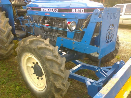 ขายรถไถฟอร์ด 6610 4*4 คานหน้า คาราโล่ ทะเบียนพร้อม