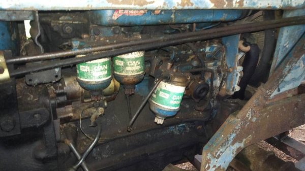 ขายรถไถ FORD 6600 ใส่เครื่อง 6610 3 จาน 7 จาน ใบมีดดันหน้า เล่มทะเบียน ราคา 180000