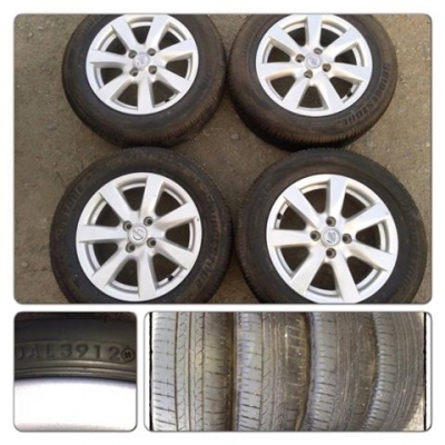 ขายล้อแม็กซ์15 Nissan Almera + ยางปลายปี12 ราคา 9,900 บ.ถูก