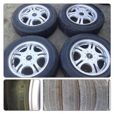 ขายล้อแม็กมือ2 ขอบ 14 4รู100 สีบรอนซ์ พร้อมยาง ปี 10 ราคา 3,200 บาทถูก