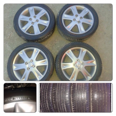 ขายล้อแม็กซ์Top Yaris RS ขอบ 16 รมดำ 4รู100 +ยางปี 13 ราคา 12,900บ.ถูก