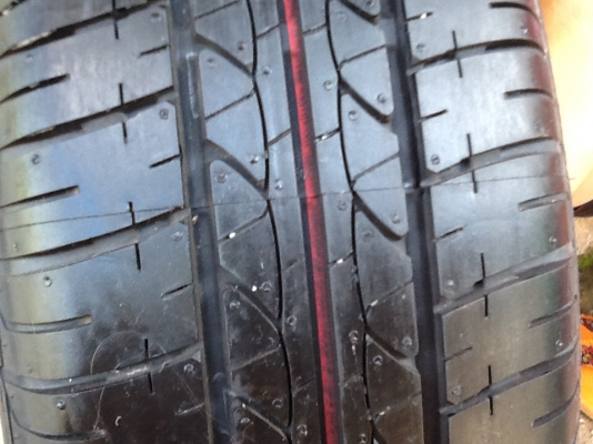 ยางถอดป้ายแดง175/70R14. ปี13Bridgestone