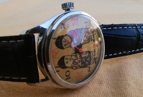 Camy Swiss movt (เครื่อง swiss) ไขลาน หน้าอวยพรตุ๊กตาจีน สายหนังใหม่ ขนาด 34 มม.(รวมเม็ด) สภาพ 90\%