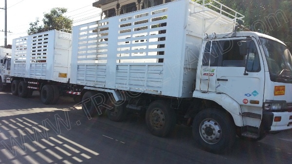 รถบรรทุกพ่วงแม่-ลูก ยี่ห้อ NISSAN  320 แรงม้า ติดแก๊ส NGV 8 ถัง ลักษณะถังยืน