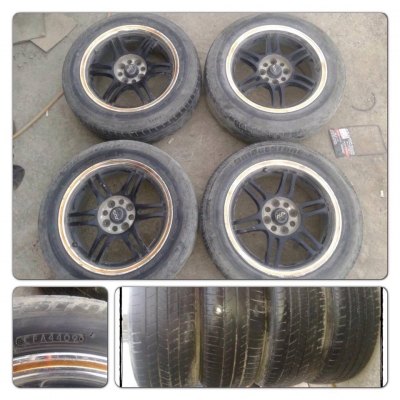 ขายล้อแม็กมือ2 ขอบ15 6ก้านคู่ สีดำขอบส้ม 4รู100+ยาง 5,300 บาทถูก