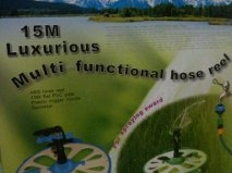 สายยางม้วนเก็บได้หัวปรับได้หลายระดับ ยาว 15 เมตร  ของใหม่แกะกล่อง