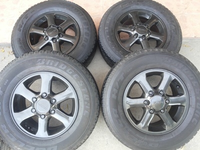 ขายล้อแม็กISUZU 16 นิ้ว 6 ก้าน ( สีกัลเงา ) พร้อมยาง BRIDGESTONE DUELER  HT  1 ชุด