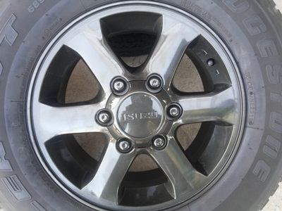 ขายล้อแม็กISUZU 16 นิ้ว 6 ก้าน ( สีกัลเงา ) พร้อมยาง BRIDGESTONE DUELER HT 1 ชุด