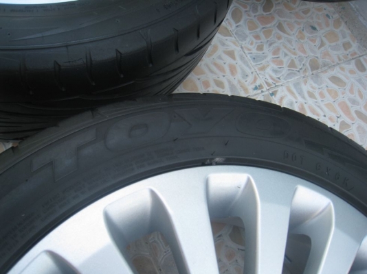 ขายล้อแม็กเดิม ford fiesta 15"x6"  4/100 et45 +ยางปี09(081-3747940)