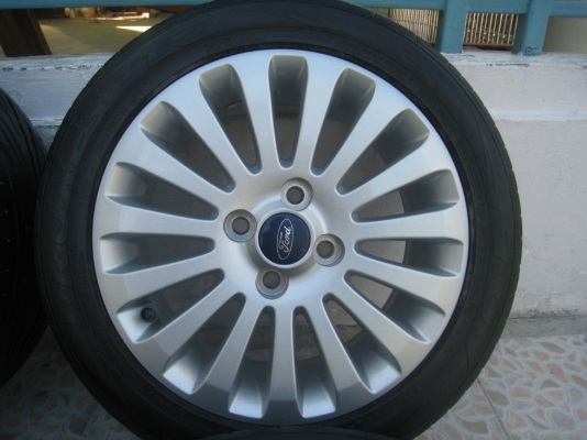 ขายล้อแม็กเดิม ford fiesta 15"x6"  4/100 et45 +ยางปี09(081-3747940)