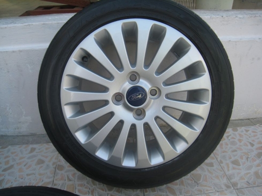 ขายล้อแม็กเดิม ford fiesta 15"x6"  4/100 et45 +ยางปี09(081-3747940)
